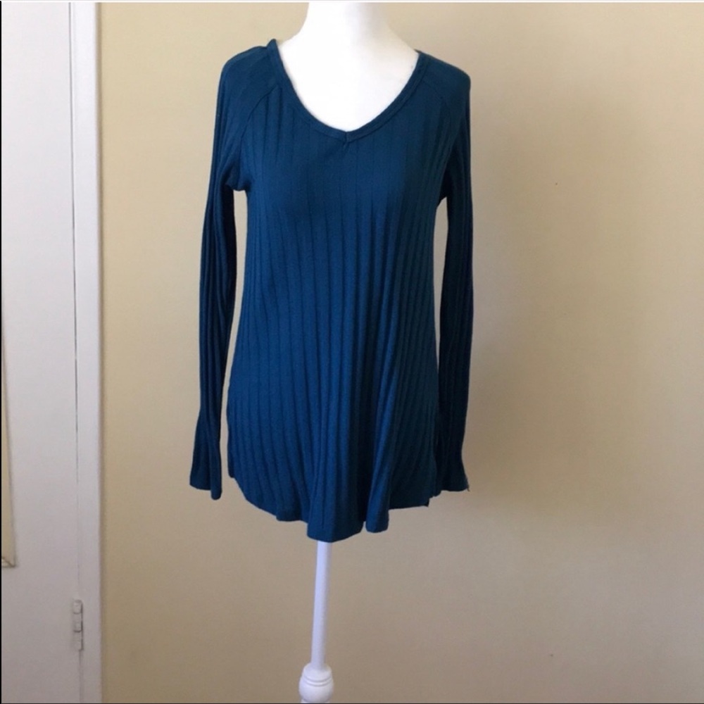 Teal ribbed sweater.